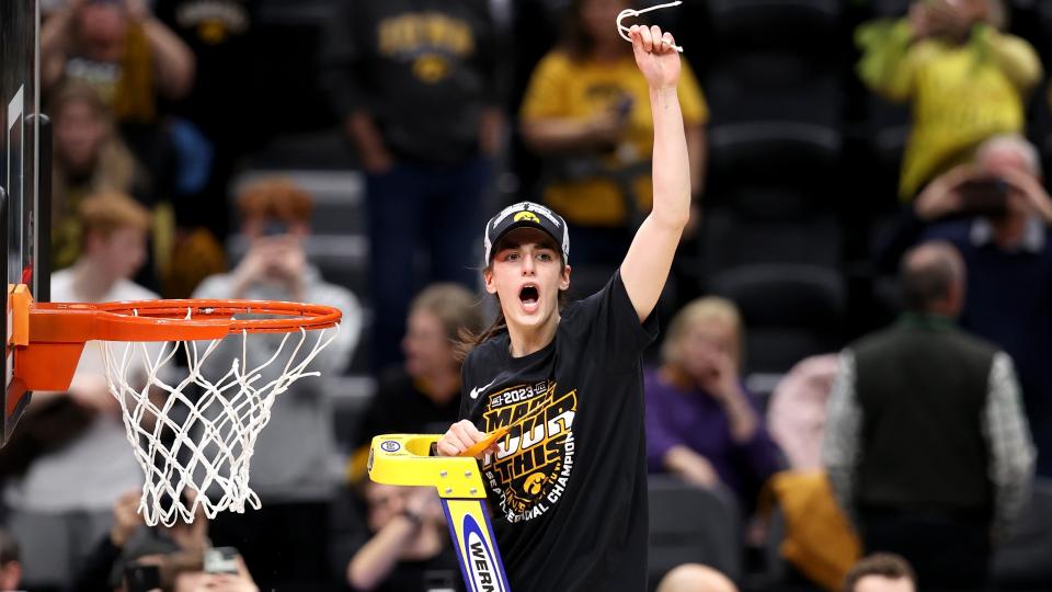 Caitlin Clark celebrates after defeating Louisville in the Elite Eight.